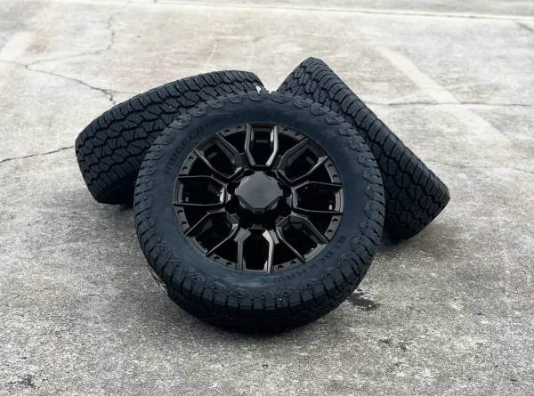 2011-2025 GMC Sierra 2500 Black SLT 20″ 8-180 Wheels 265/60R20 A/T Tires